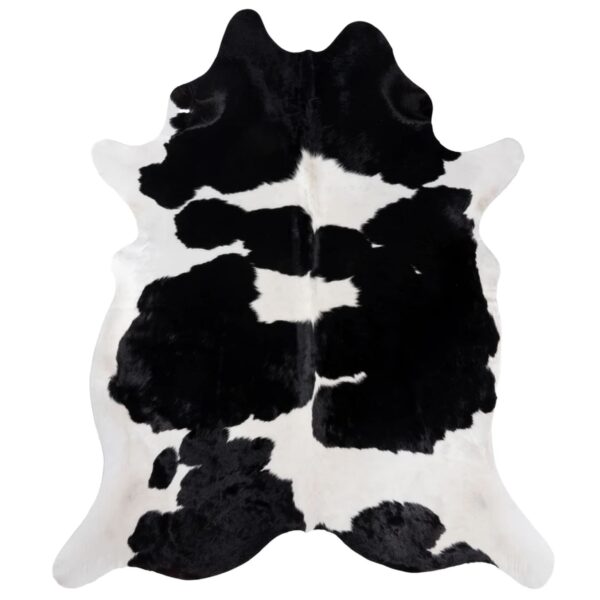 Authentic hair-on-hide cowhide rug in black and white for modern spaces