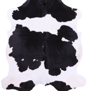 Bold pattern black and white cowhide rug with natural hair-on-hide finish