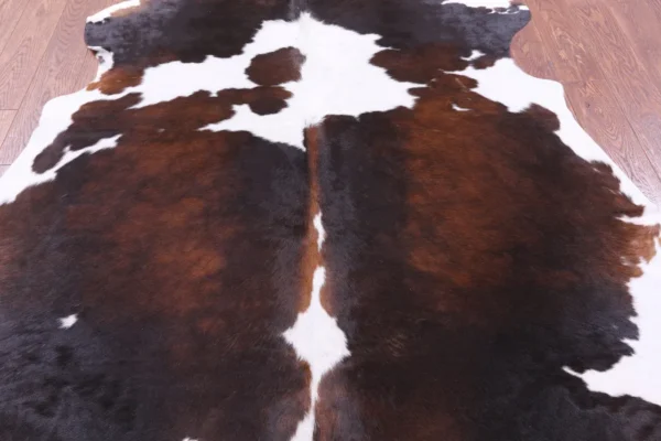 Classic Tricolor Cowhide Rug in a modern setting