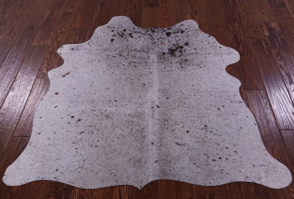 Rustic Cowhide Rug in Farmhouse Kitchen