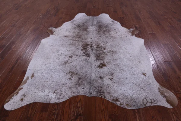 Natural Cowhide Rug in Sustainable Living Space