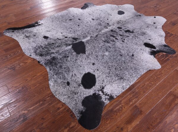 Spattered Salt and Pepper Cowhide Rug in a modern setting