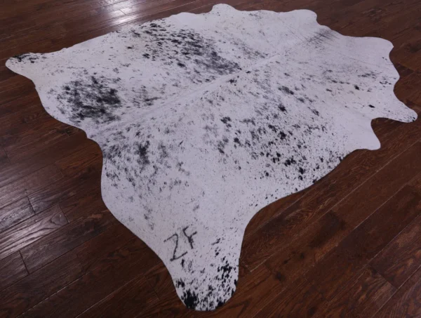 Natural Hair on Salt and Pepper Rug in a cozy setting